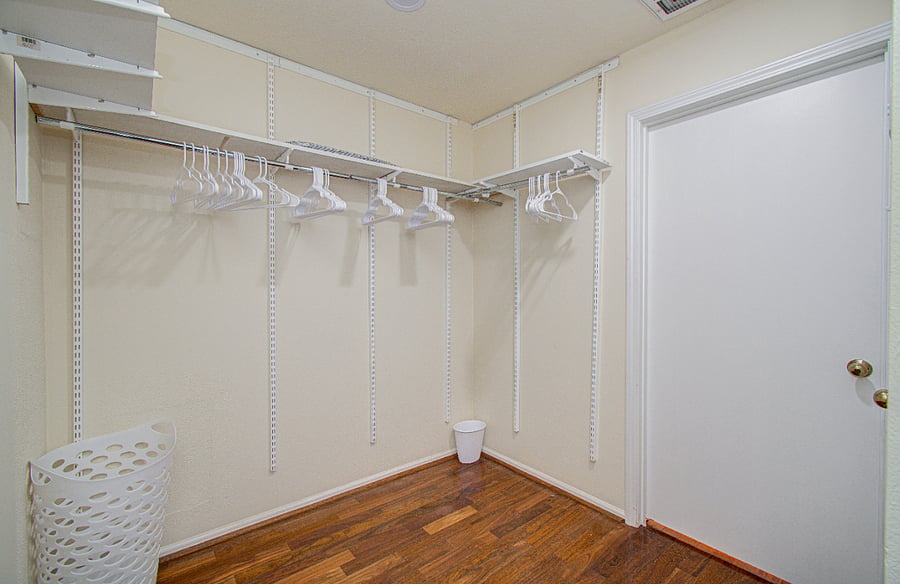 Spacious closet with linen cabinet
