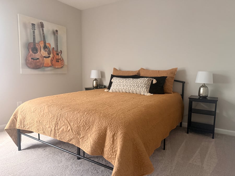 Upstairs second bedroom with queen bed