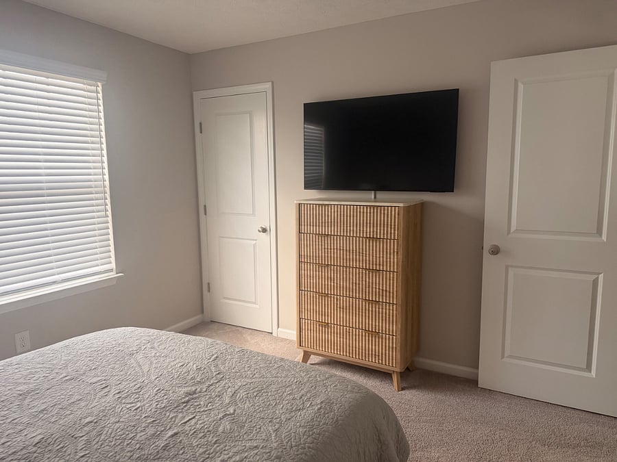 Upstairs first bedroom with 55" smart TV