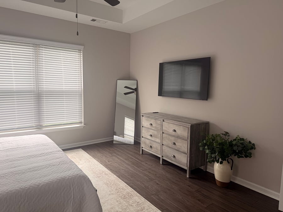 Master bedroom with 55" smart TV