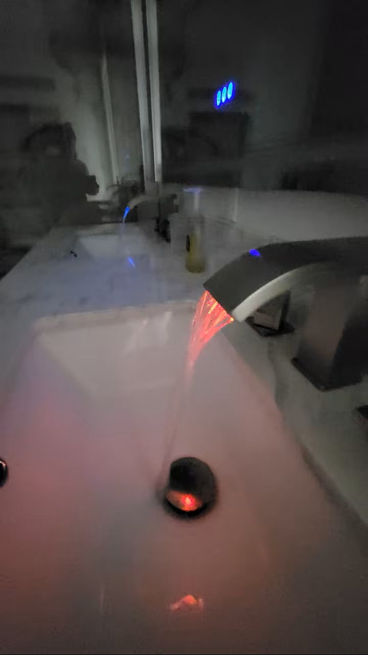 Light censored faucet showing hot (red), cold (blue), and warm (green) temperature.