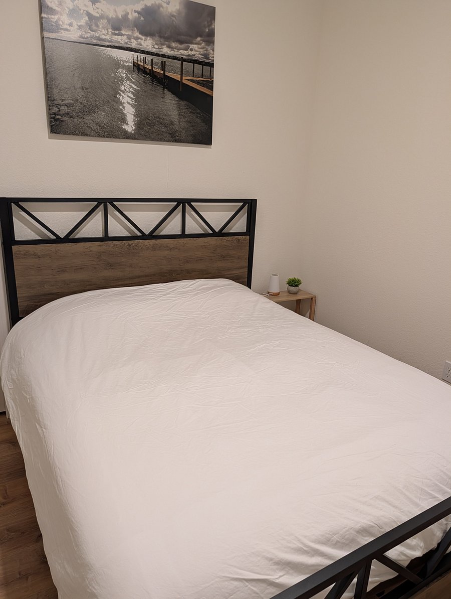 another view of two of two smaller bedrooms