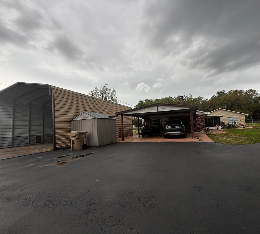 Ample parking a covered carport