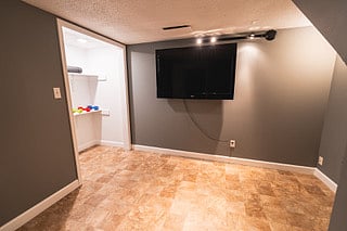 Extra room with some gym equipment.