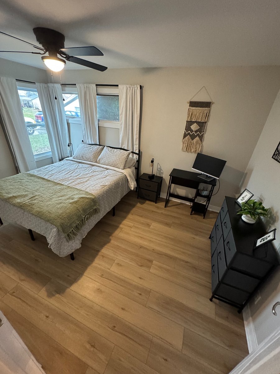 Bedroom 2 with Queen Bed and small desk with computer monitor