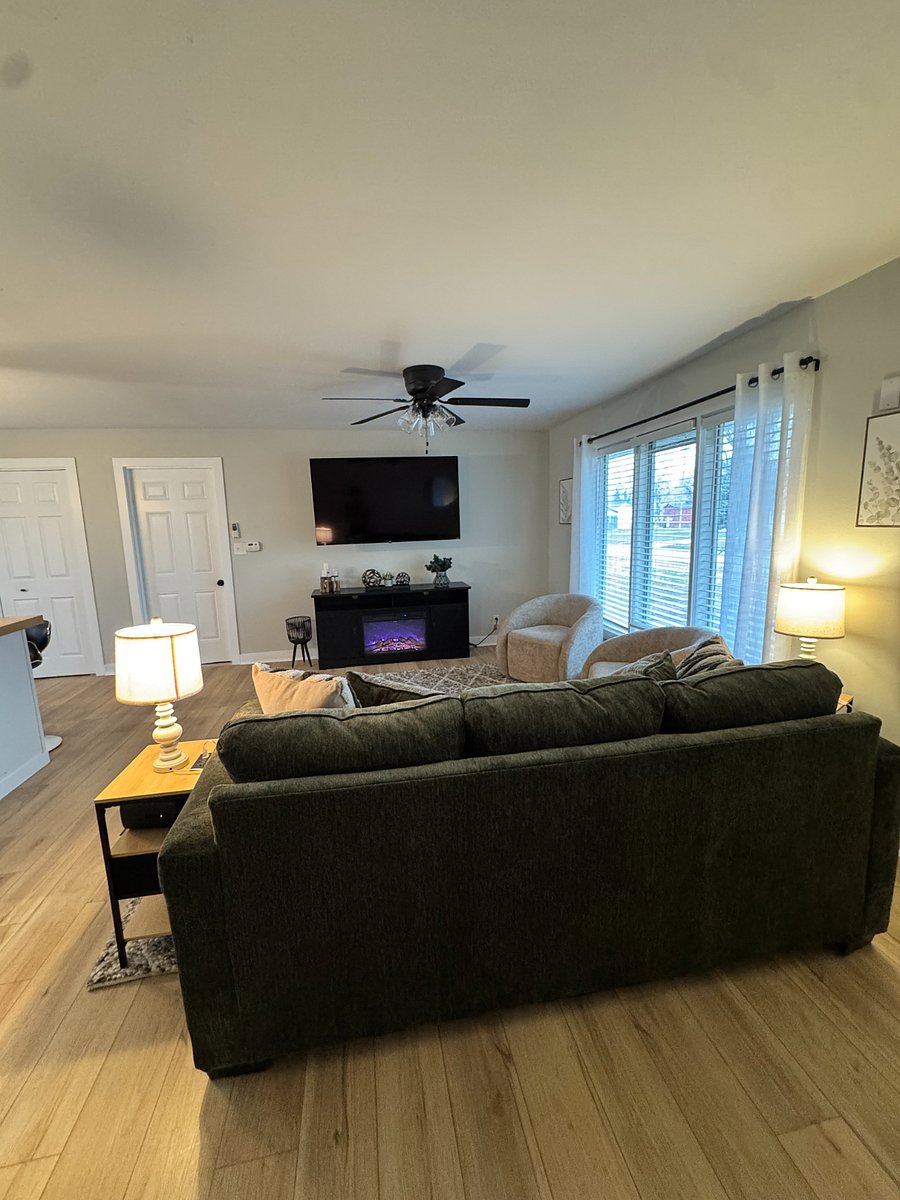 Living room, door on the left is to the attached garage