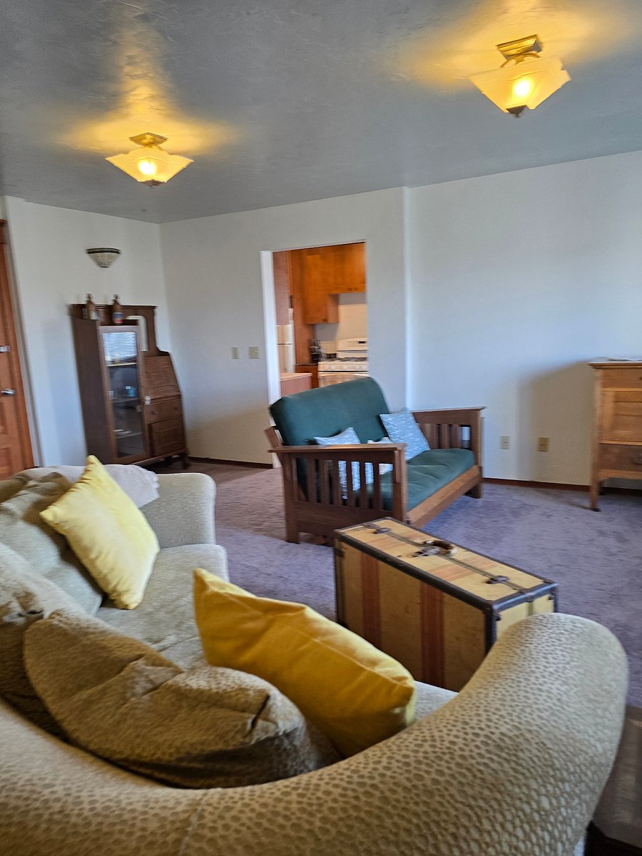 Ample room, to set up this open concept room with office space, art space  or any number of options for living. 