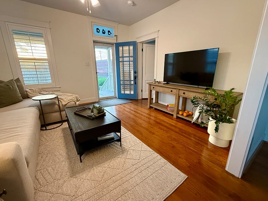 Living Room with Pottery Barn furniture, oversized couch & 55 inch Roku Smart TV