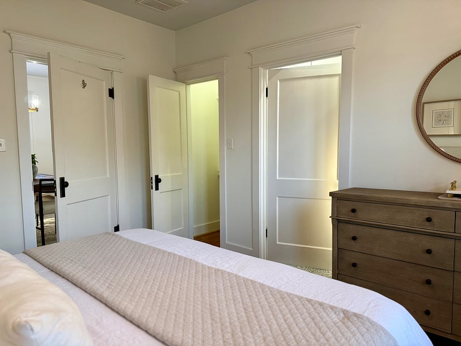 Primary bedroom dresser and closet