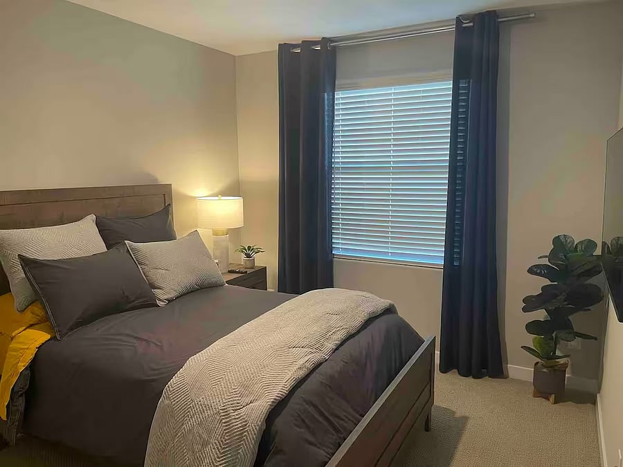 Comfortable guest bedroom with full bed, Samsung Smart TV, and closet spaceideal for visiting family, roommates, or flexible work space.