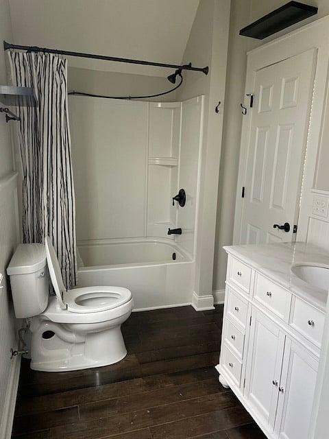 Separate bathroom with tub, shower and vanity