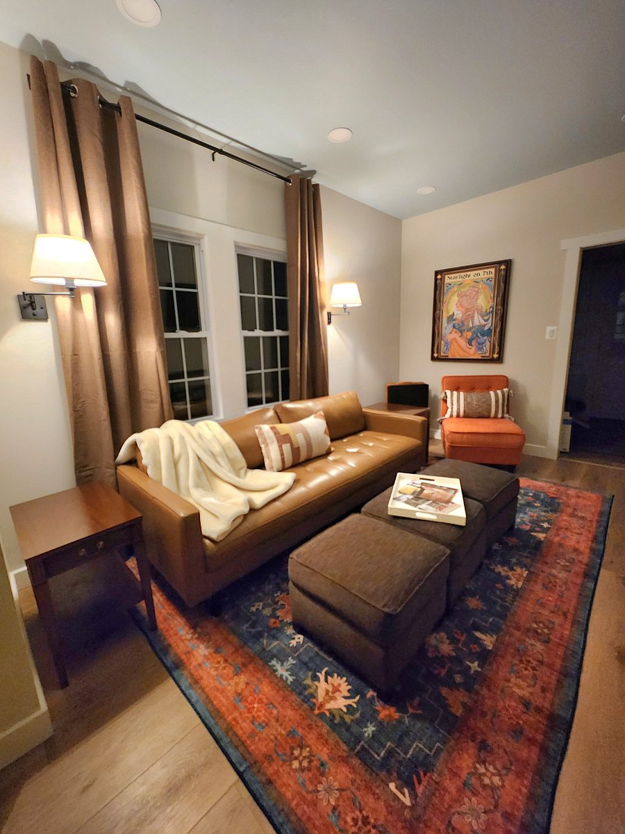 Cozy living area with leather sofa and Smart TV