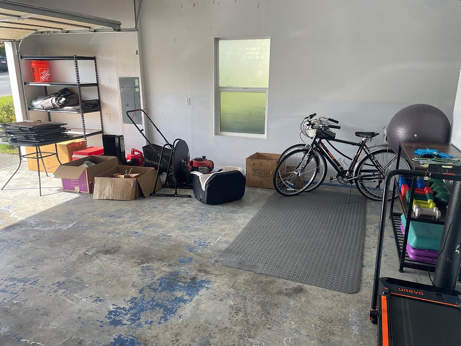 Spacious garage with gym equipment