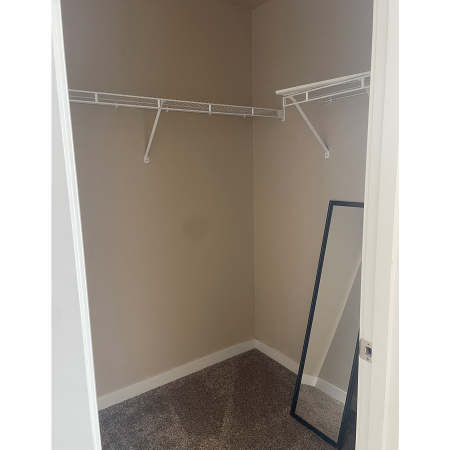 Spacious walk in closet in private guest room