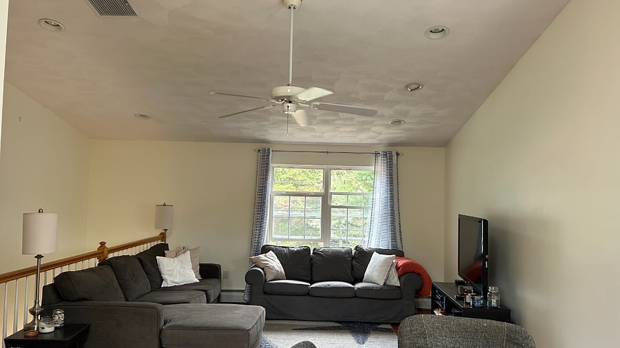 Open living room and kitchen area upstairs