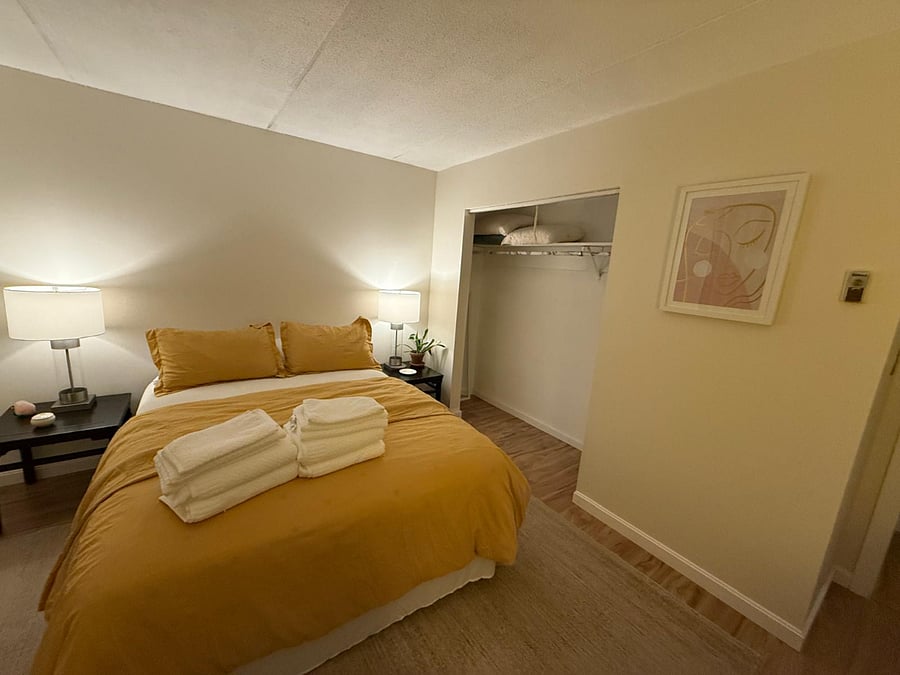Bedroom one with queen bed