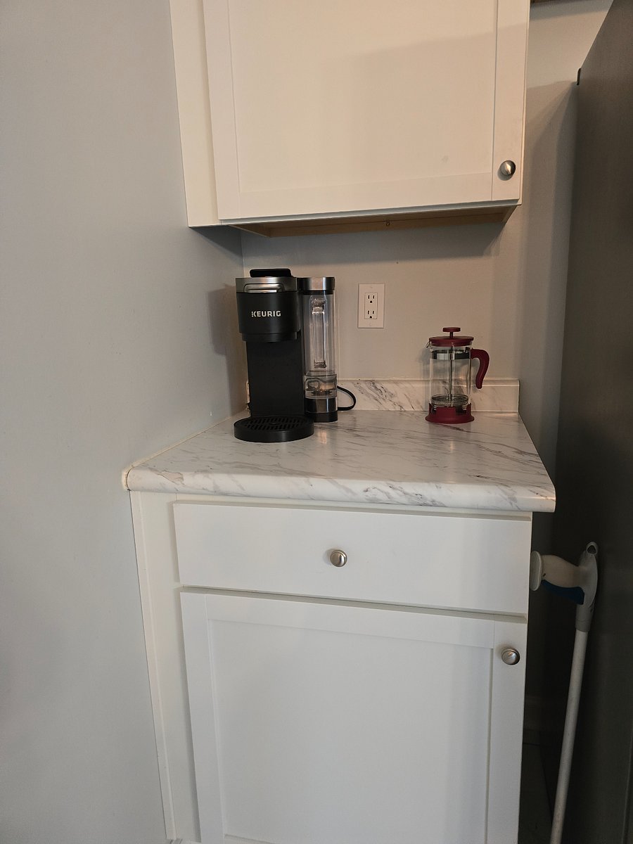 Keurig coffee maker and french press.