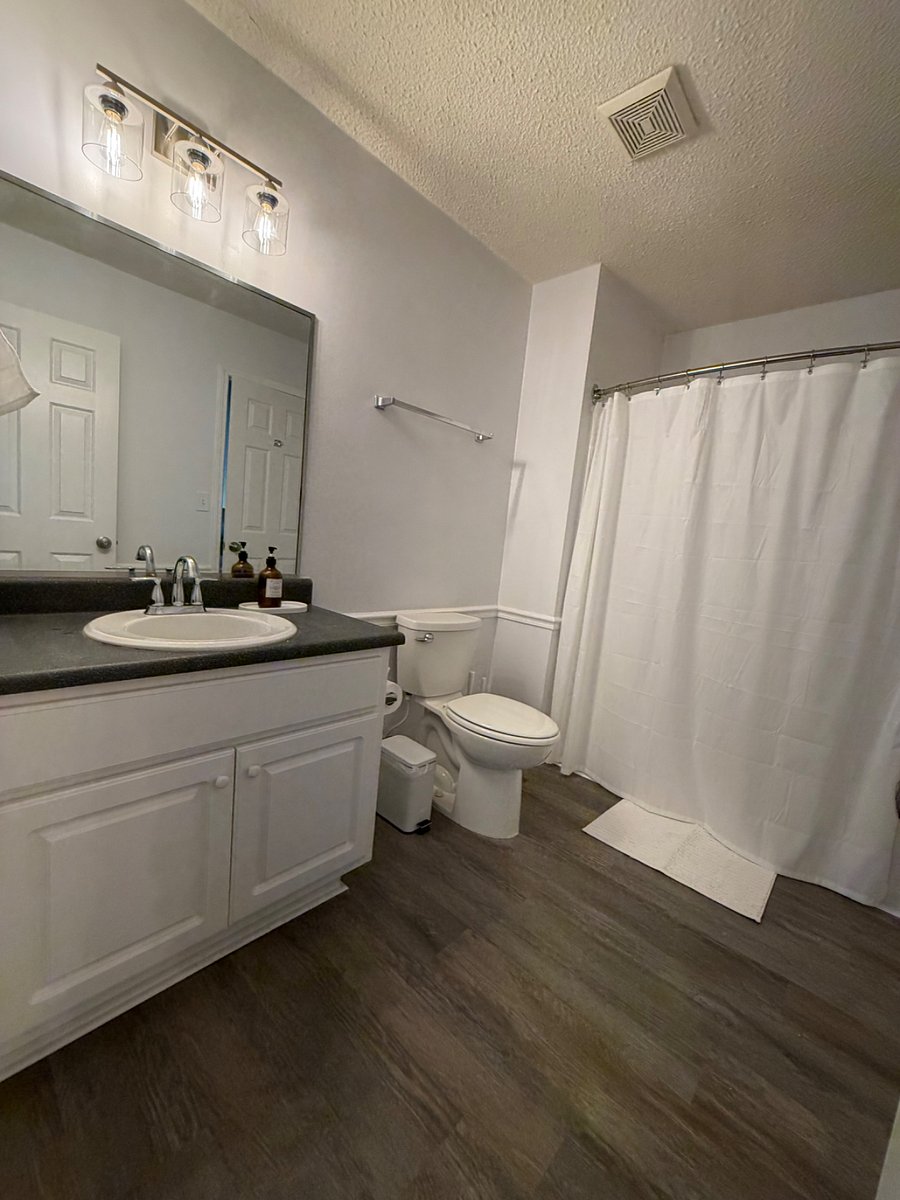 Includes a dual-access bathroom with a privacy door, allowing the bedroom to be fully closed off from the common area.