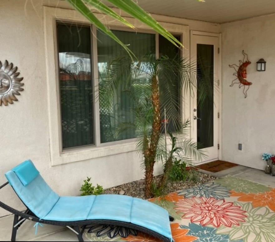 The private entrance faces the Golf Course and its under the large covered  patio