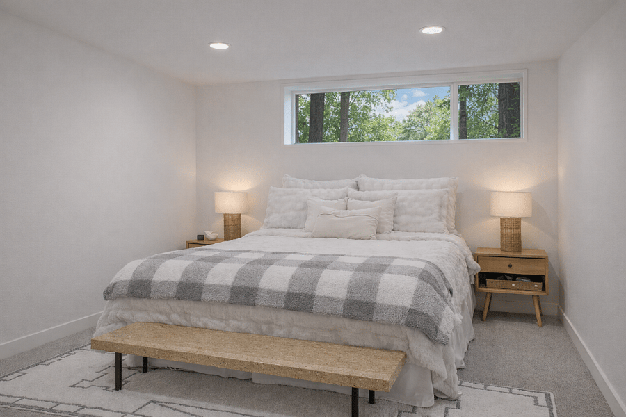 guest room with queen bed