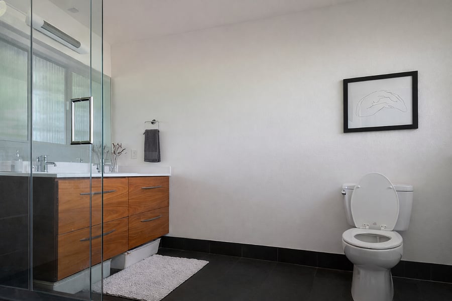 rainshower, heated floors, and his and her sinks