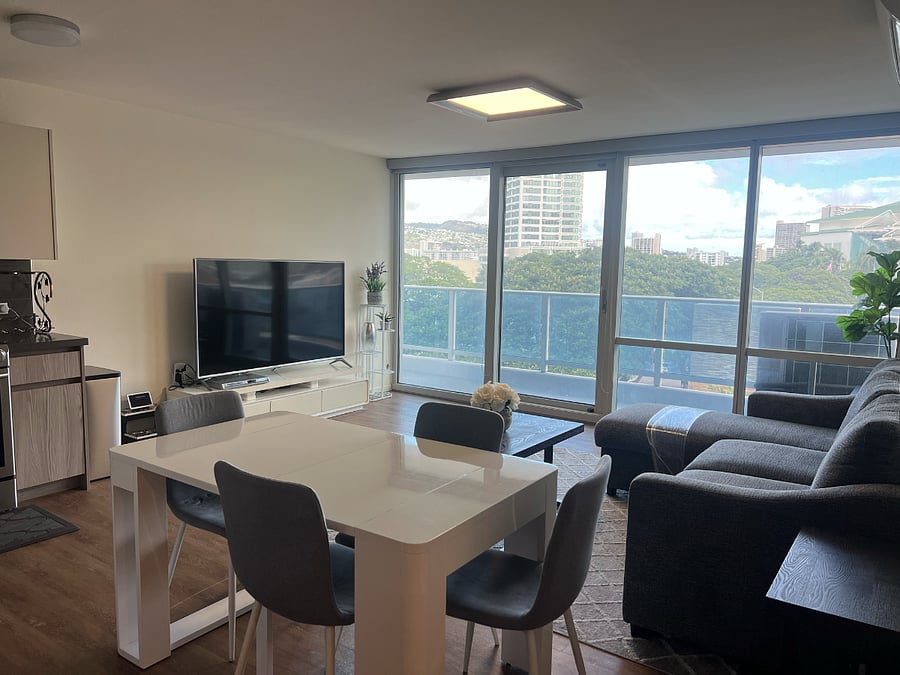 Expandable 4-6 top dining table. Beyond the Living Room is a very usable ~101 sq. ft. lanai.