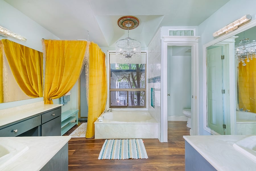 Room 5 - 2 spaces currently avaiable - Ladies' Hostel-Style Suite - oval tub, shower, private toilet, two sinks, chandelier
