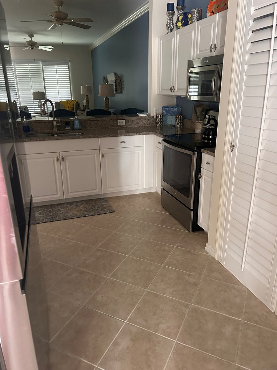 Fully stocked kitchen with counter height stools