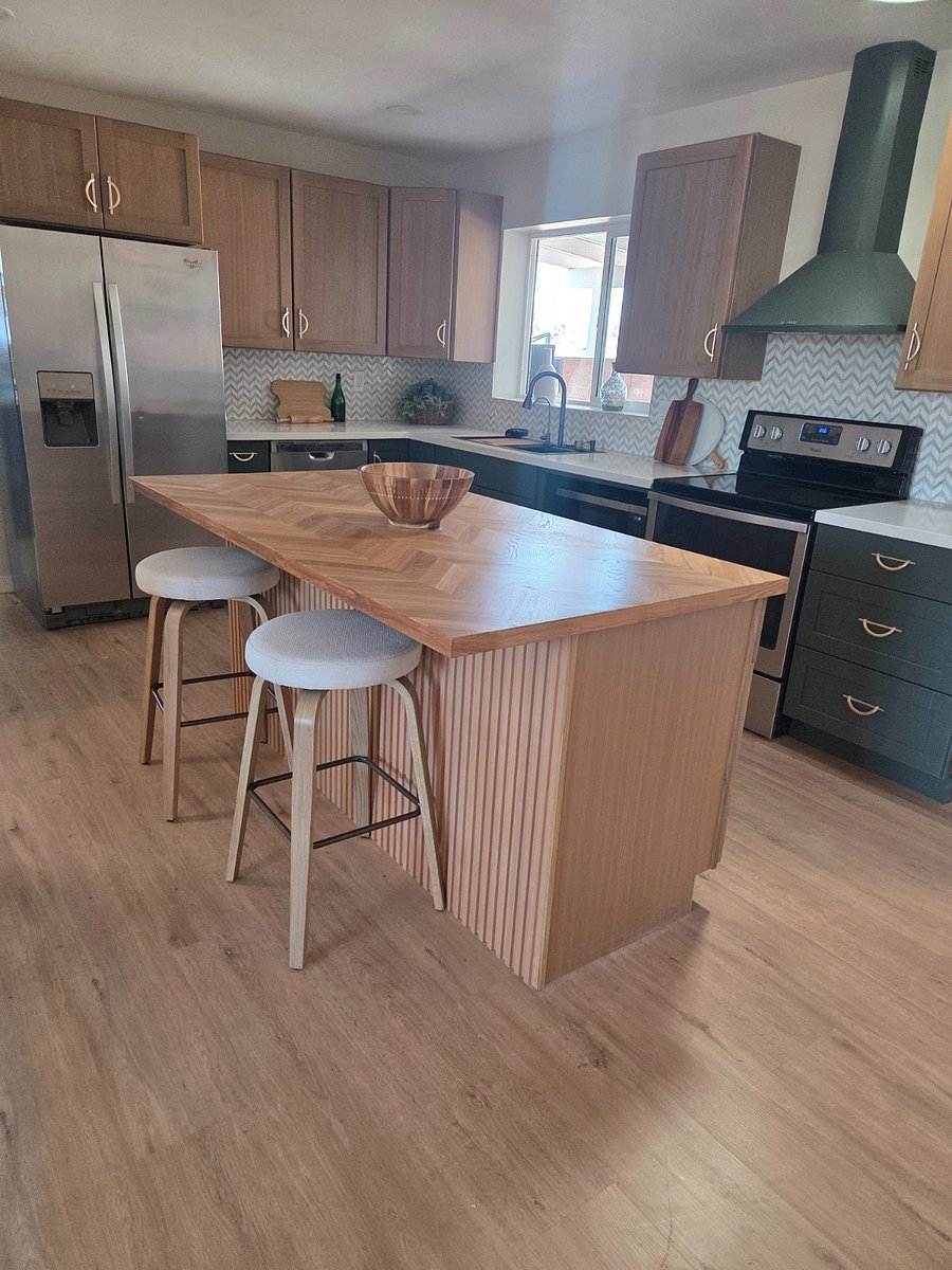 Kitchen island with seating and close up of beautiful butcher block island counter