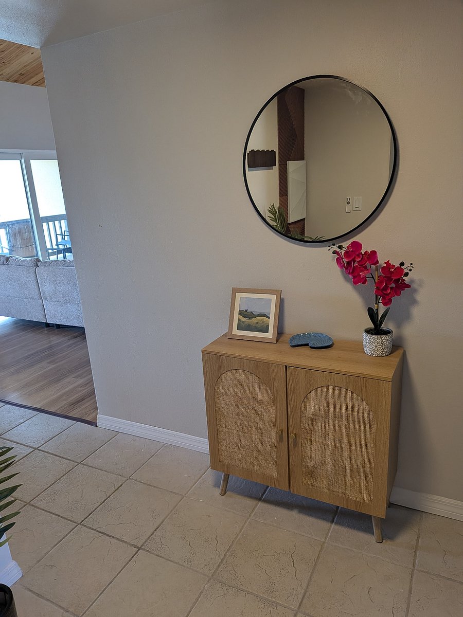 entry way - living room, kitchen and dining room to the left, bedrooms and bathroom to the right.