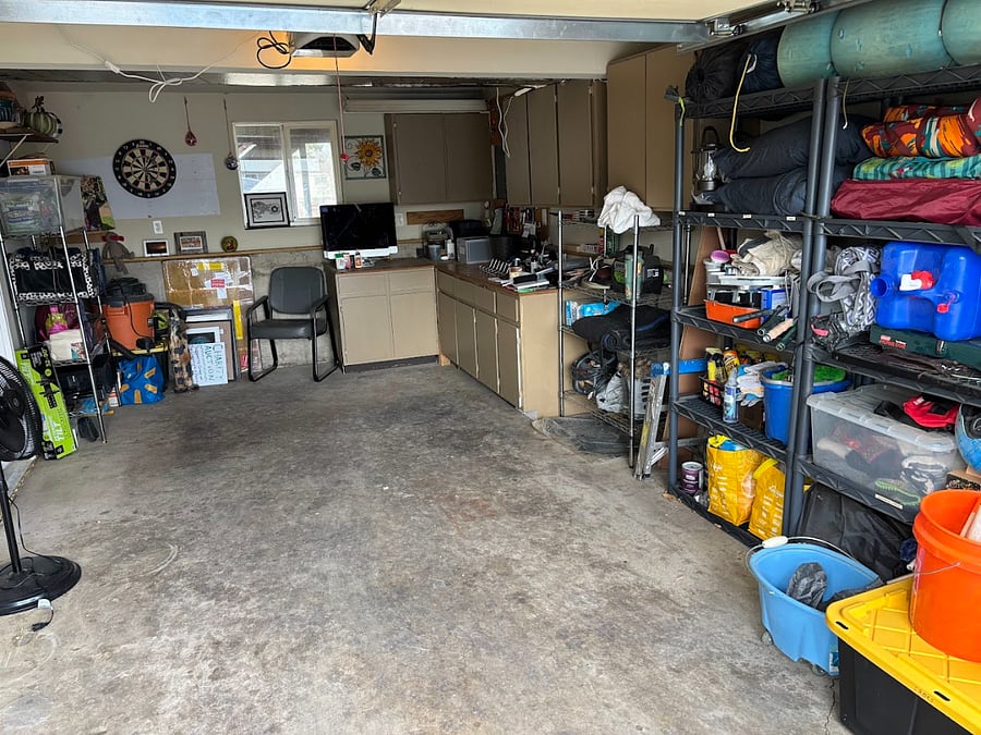 Garage - Plenty of storage available in the cupboards