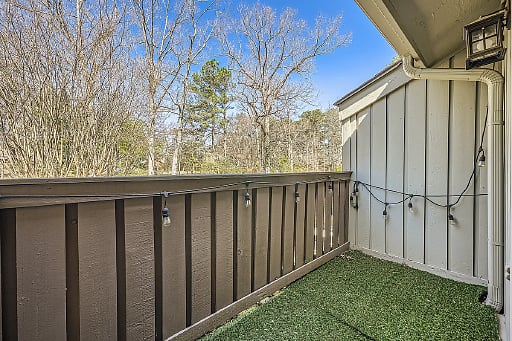 Enjoy fresh air from the porch - perfect for your morning coffee or an evening wind-down.