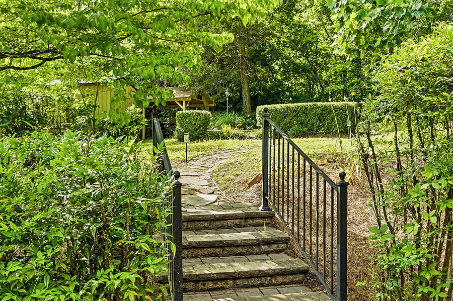 Steps from rear patio to firepit area