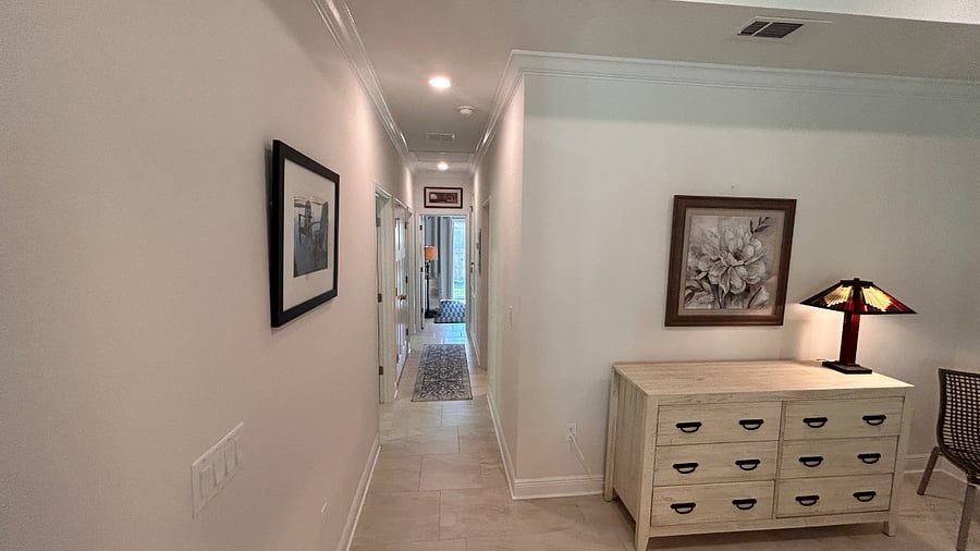 Hall to bedrooms and backyard accessbed room