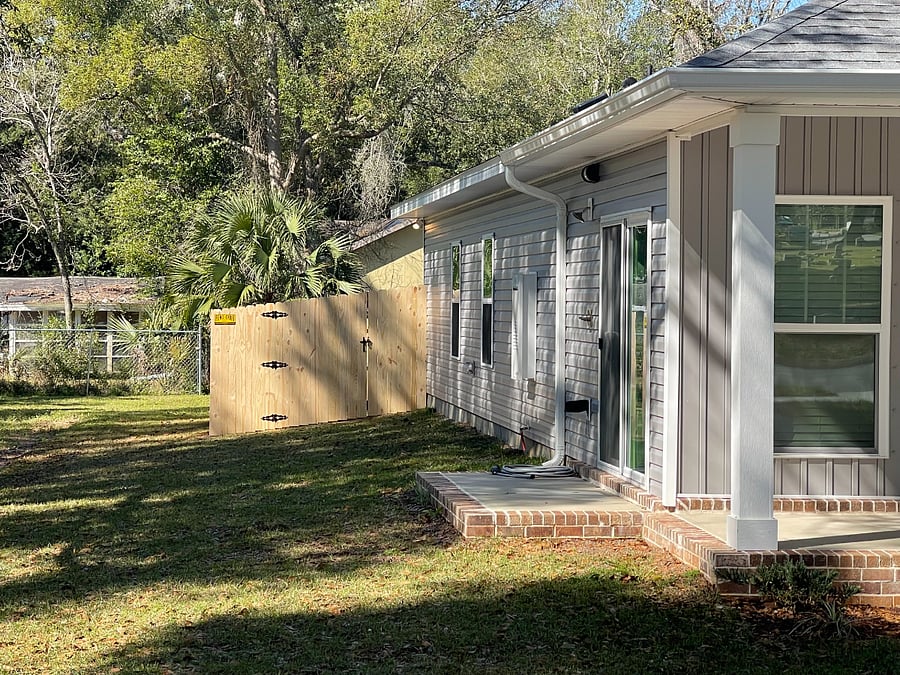 Side patio entrance to kitchen with outdoor shower-no neighbors to your left