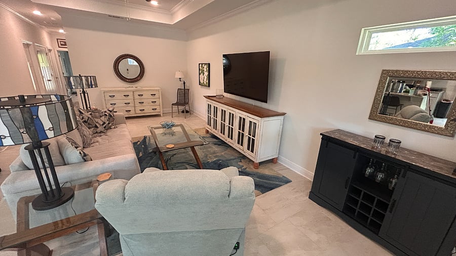 Living area includes a recliner chair and comfortable couch