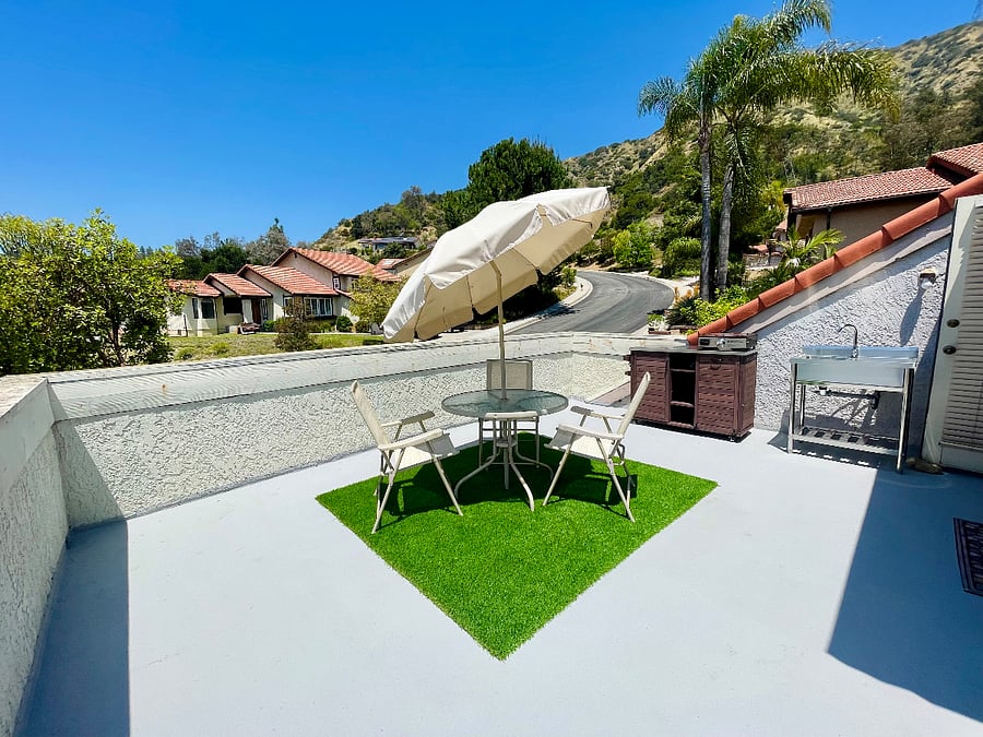 Extra large private balcony with beautiful foothill backdrop.
