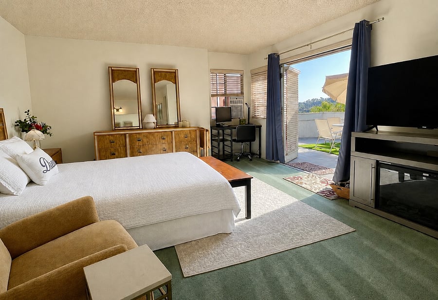French doors flood the room with fresh air and sunlight.