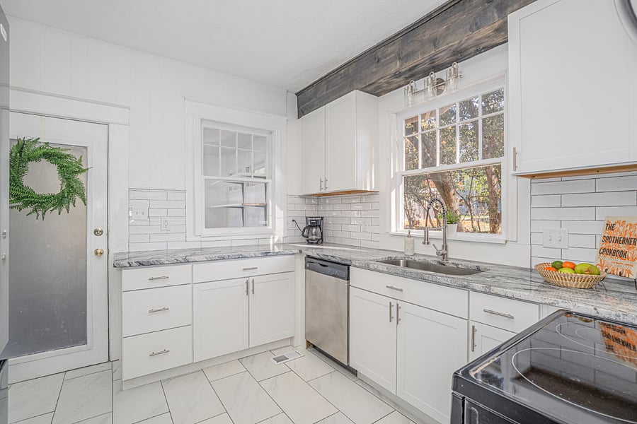 Kitchen with stainless appliances, pantry, granite countertops 