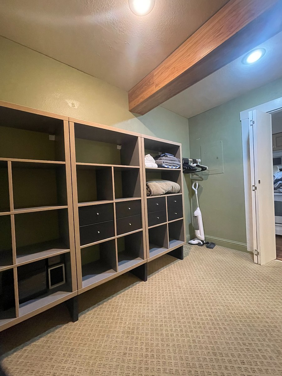 Walk in closet outside of bathroom