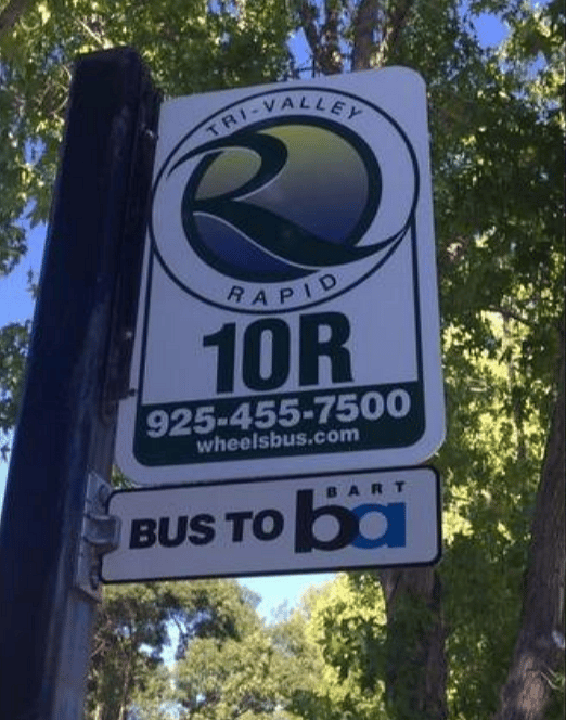 NEXT TO Bus Stop