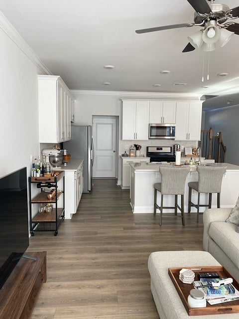 Seating for two at large island. Six recessed lights provide excellent lighting. Keurig coffee-maker, Ninja professional for smoothies, toaster, crockpot, knife block, stainless EKO trash bin & spice rack, all dishes, cookware, bakeware, utensils, linens, Alexa, starter supplies.