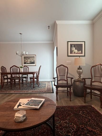 Sunny, cheerful dining area w/custom roller blind for privacy. Seating for six at beautiful cherry dining set.