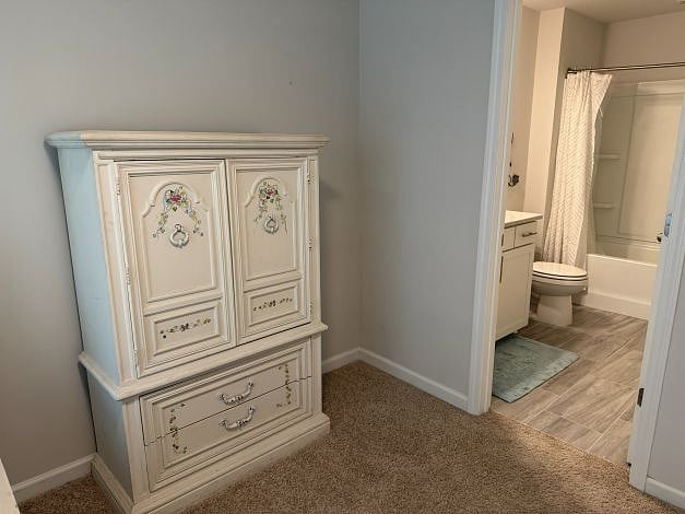 En-suite, full secondary bathroom with shower/tub combo.