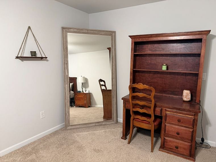 Massive mirror and desk w/hutch in primary bedroom. Desk can be moved to office (3rd bedroom), if desired.