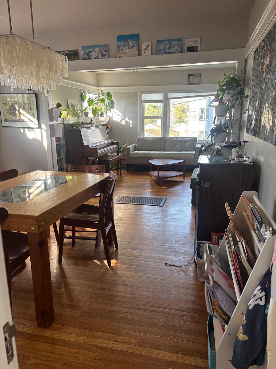 dining room with view towards living room (no rug in this image)