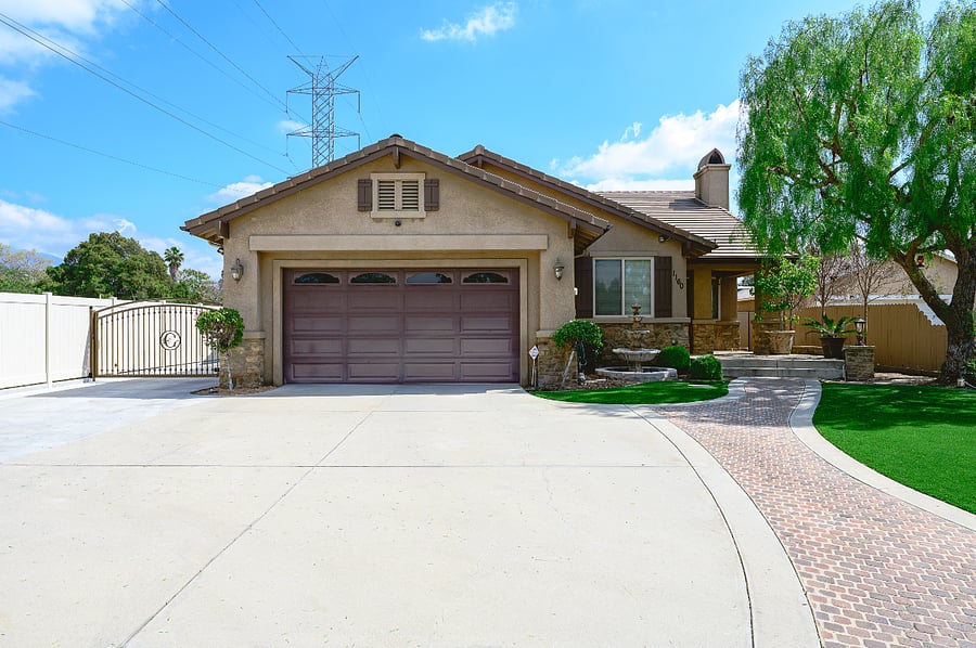 Front house w/ sec gate.