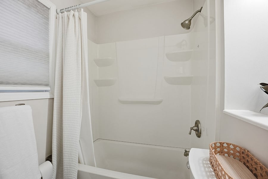 Bright, Clean Master Bathroom with Extra Storage

This well-maintained master bathroom offers a clean, simple space designed for comfort and convenience. The full shower/tub combo is perfect for both quick routines and relaxing after long shifts, with built-in shelving to keep essentials within easy reach.

A standout feature is the additional linen closet located right in the bathroom, providing extra storage for towels, toiletries, and personal items, ideal for longer stays. Natural light from the window keeps the space feeling fresh while maintaining privacy.

Shared areas of the home are professionally cleaned on a regular basis, adding an extra level of ease and peace of mind.

Highlights:

Full shower/tub combo with built-in shelving

Linen closet for additional storage

Bright, clean, and easy-to-maintain space

Natural light with privacy

Professionally cleaned shared spaces