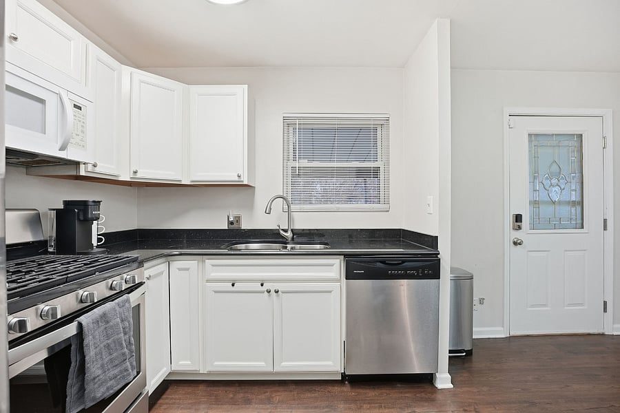 Kitchen with Backyard Access
This fully stocked, nursefriendly kitchen is designed for comfort and efficiency during extended stays. It offers plenty of cabinets for storage, a dishwasher for easy cleanup, a gas stove, and a builtin microwave, ideal for cooking on a flexible schedule. Stainless steel appliances, durable countertops, and bright overhead lighting create a clean, modern workspace thats easy to maintain. A window over the sink provides natural light, and essential cookware, flatware, and a coffee machine are included to make settling in effortless. The kitchen also offers convenient access to a beautiful, quiet, and securely gated backyard, perfect for fresh air, a peaceful break, or unwinding after long shifts.
