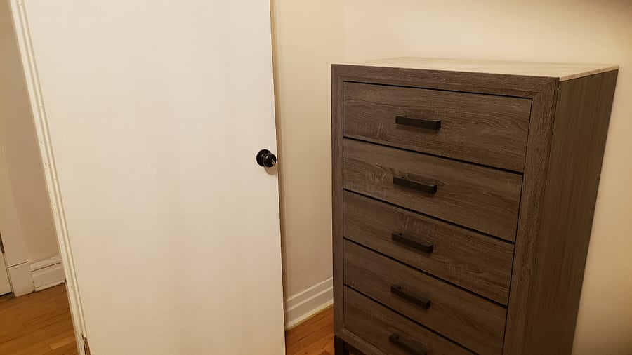 Bedroom 1: Keyed door and Dresser